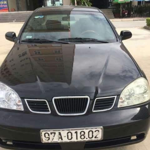 Bán xe Daewoo Lacetti đời 2005, màu đen, hình thức còn rất đẹp, chạy khỏe0