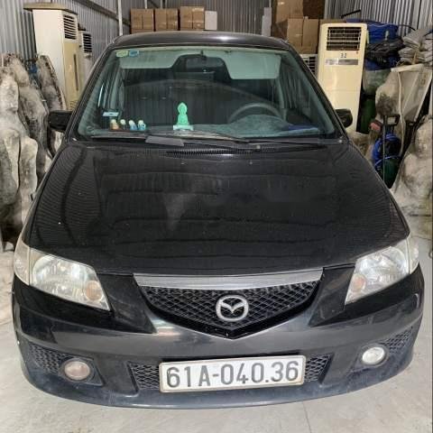 Cần bán Mazda Premacy năm sản xuất 2003, màu đen, xe gia đình sử dụng