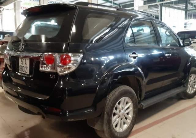 Cần bán lại xe Toyota Fortuner 2014, màu đen còn mới