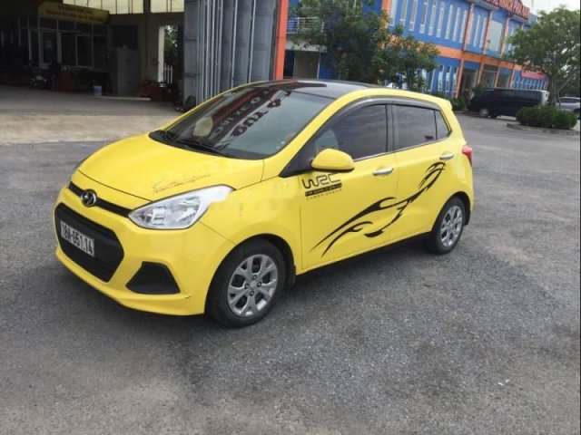 Bán ô tô Hyundai Grand i10 2015, màu vàng, xe đẹp, gầm bệ chắc chắn đã nên đồ chơi0