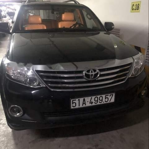 Cần bán lại xe Toyota Fortuner đời 2013, màu đen, xe nhà ít sử dụng, bảo dưỡng định kỳ