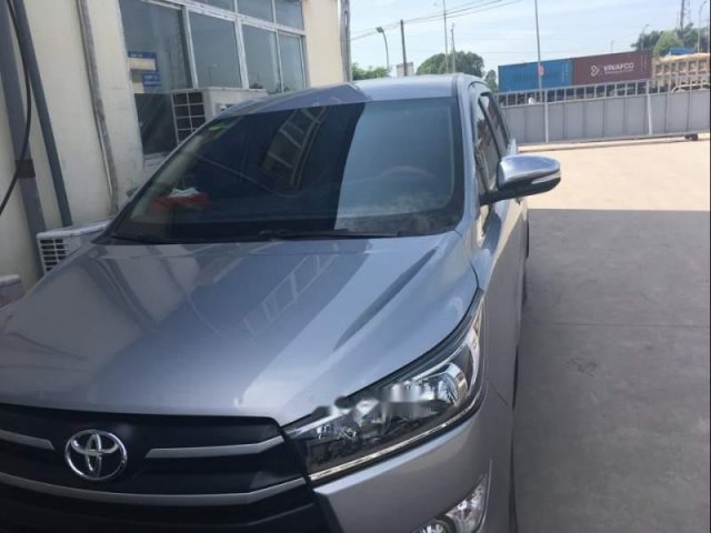 Bán xe cũ Toyota Innova sản xuất 2016, màu bạc0