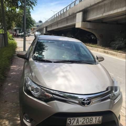 Bán Toyota Vios sản xuất năm 2015, màu vàng cát0