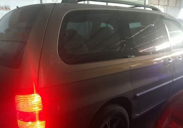 Bán ô tô Kia Carnival sản xuất năm 2006, màu vàng cát