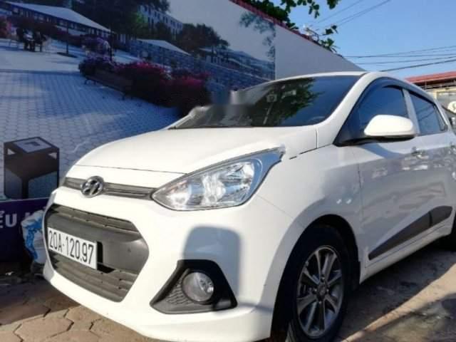 Cần bán Hyundai Grand i10 AT 2015, màu trắng