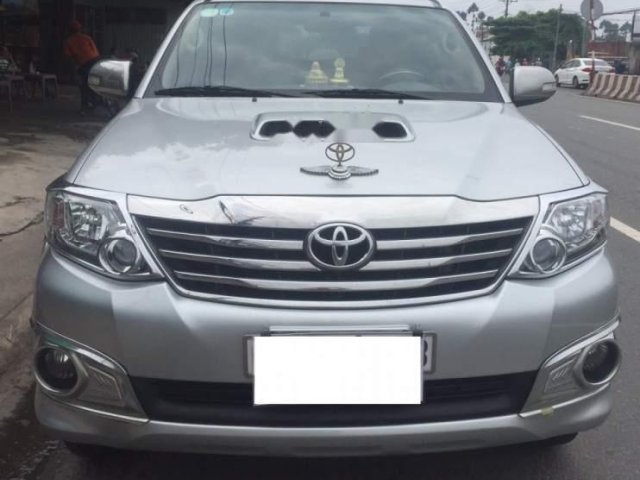 Chính chủ bán Toyota Fortuner 2013, màu bạc0