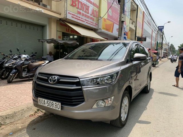 Bán ô tô Toyota Innova 2018 bản E màu vàng cát