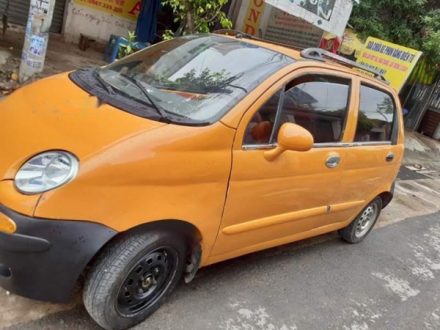 Bán ô tô Daewoo Matiz đời 2001, màu cam