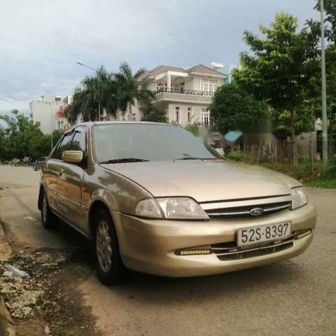 Cần bán gấp Ford Laser đời 2000, màu vàng, xe nhập, 148 triệu