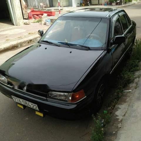 Bán xe Mazda 323 đời 1995, màu đen, nhập khẩu0