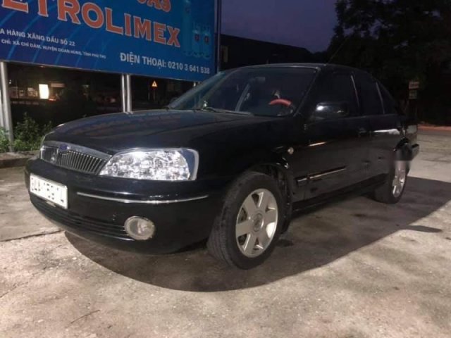 Cần bán xe Ford Laser đời 2003, màu đen