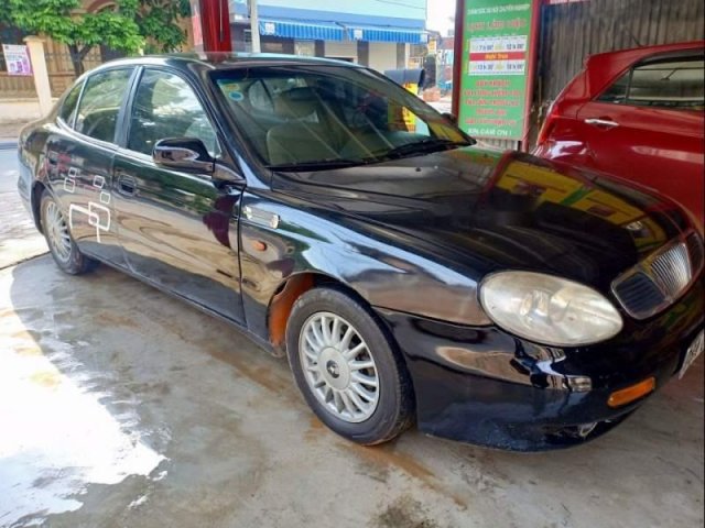 Chính chủ bán xe Daewoo Leganza đời 2002, màu đen, nhập khẩu Hàn Quốc0