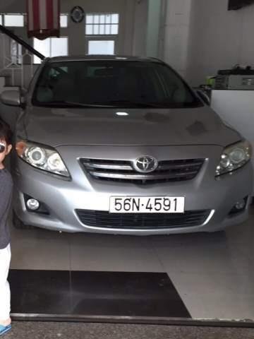 Gia đình bán Toyota Corolla altis 2009, màu bạc, nhập khẩu, 450 triệu