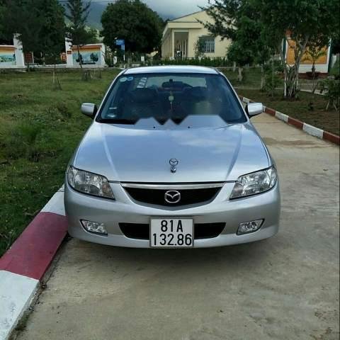 Cần bán lại xe Mazda 323 đời 2003, màu bạc