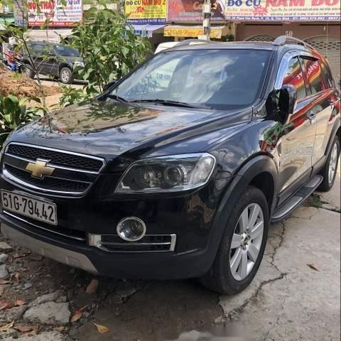 Bán Chevrolet Captiva đời 2011, màu đen còn mới, giá 390tr