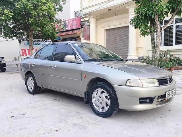 Cần bán xe Mitsubishi Lancer GLXI 1.6 MT đời 2000, màu bạc