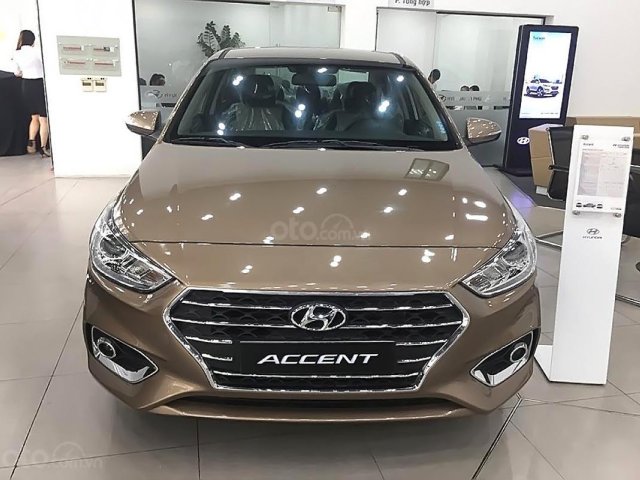 Bán xe Hyundai Accent 1.4 MT năm 2018, màu vàng cát