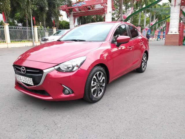 Mazda 2 1.5L AT model 2017, màu đỏ, xe nhà ít đi còn mới toanh, mới 99% luôn, giá chỉ 465 triệu0