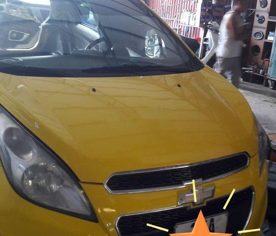 Bán xe Chevrolet Spark sản xuất 2015, màu vàng, nhập khẩu