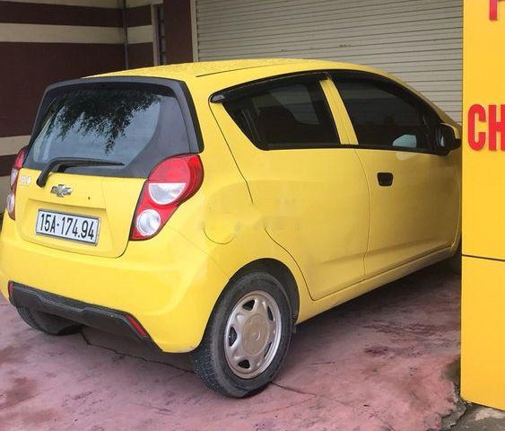 Bán Chevrolet Spark sản xuất năm 2015, màu vàng, chính chủ