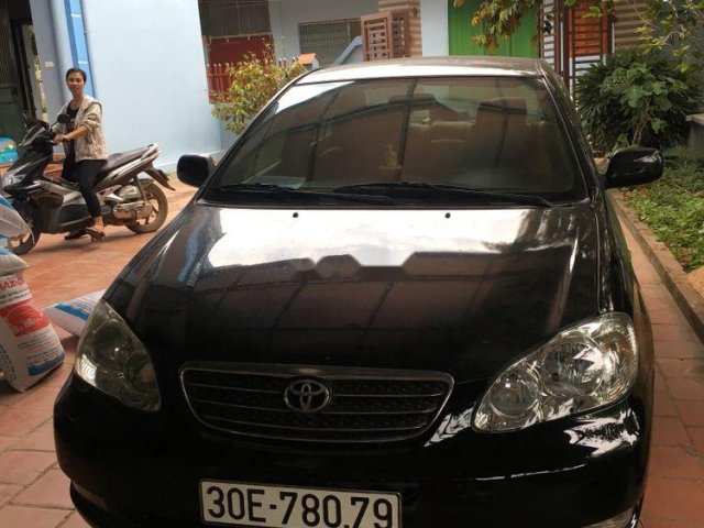 Bán Toyota Corolla altis sản xuất 2004, màu đen, 260tr0