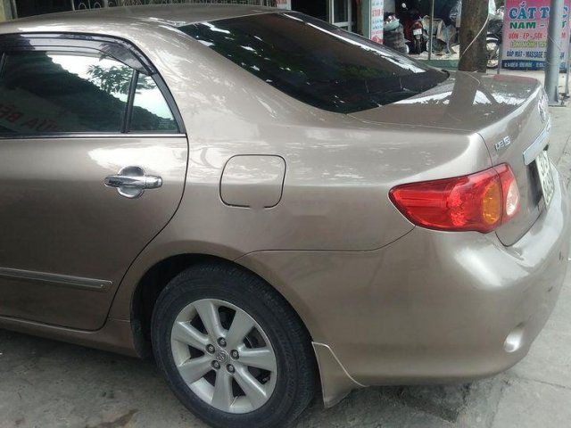 Bán Toyota Corolla altis đời 2010, màu vàng, nhập khẩu nguyên chiếc, 465 triệu0