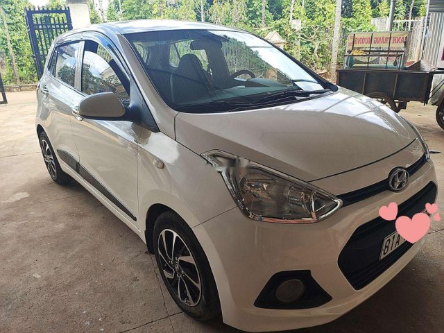 Bán Hyundai Grand i10 đời 2014, màu trắng, xe còn mới, máy móc còn nguyên bản