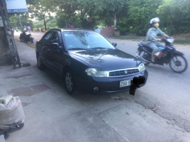 Gia đình cần bán gấp Kia Spectra MT đời 20030