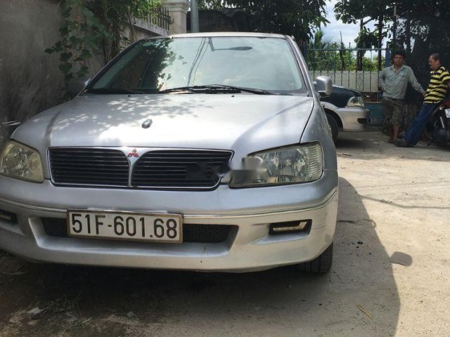 Bán xe Mitsubishi Lancer MT sản xuất năm 2002, màu bạc, ít hao xăng