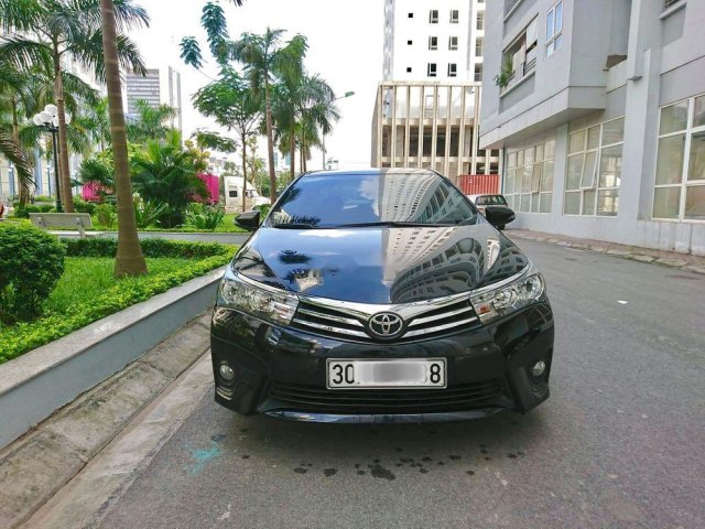 Bán ô tô Toyota Corolla altis 1.8G AT năm 2015, màu đen chính chủ, 630 triệu