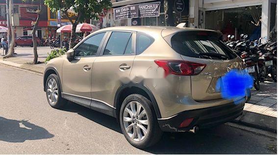 Bán xe Mazda CX 5 sản xuất 2015, màu vàng, chính chủ