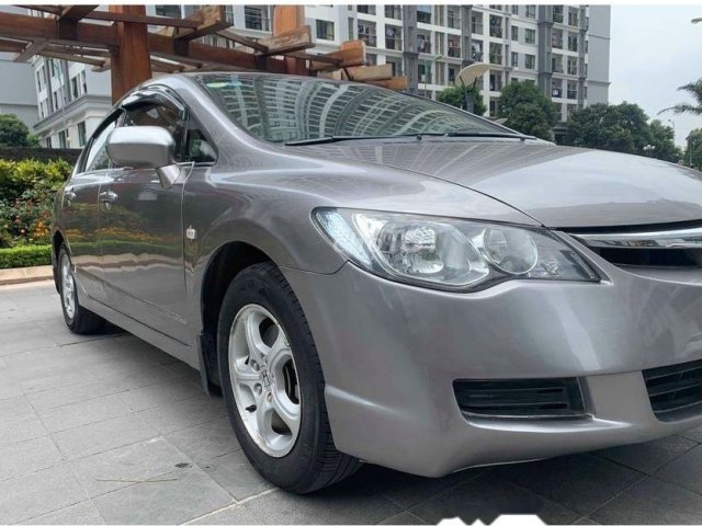 Bán lại chiếc xe Honda Civic 1.8 AT Đk 2009, số tự động, màu ghi bạc