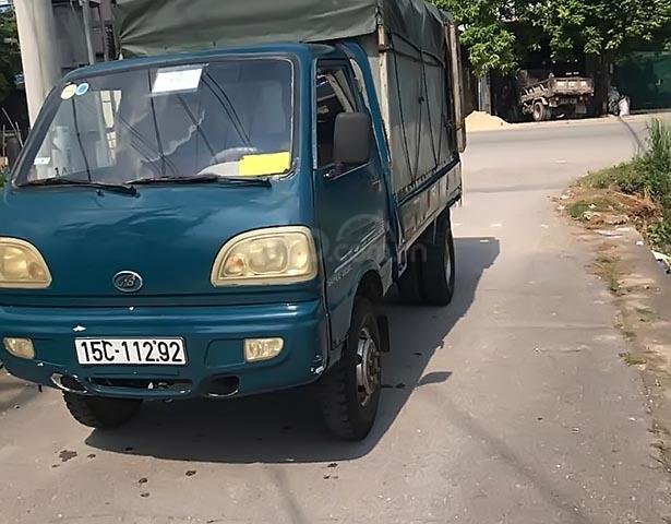 Bán Vinaxuki 1200B máy dầu 2009, lốp sau bánh kép0