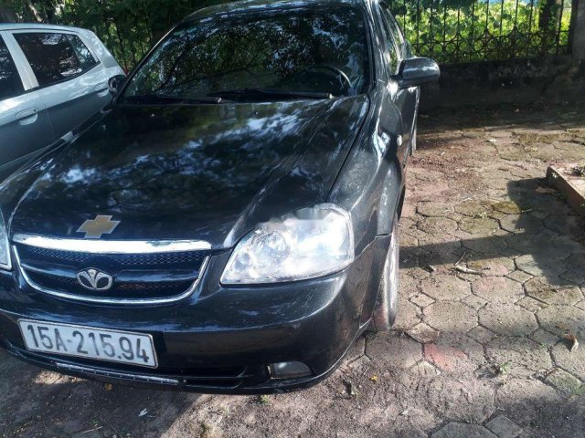 Cần bán lại xe Daewoo Lacetti sản xuất 2009, màu đen, bảo dưỡng định kì0