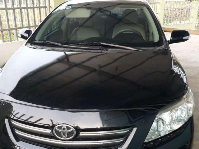 Cần bán xe Toyota Corolla altis đời 2009, màu đen