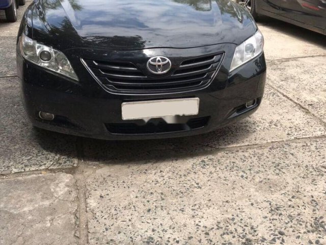 Bán Toyota Camry 2.5LE 2009, màu đen, nhập khẩu