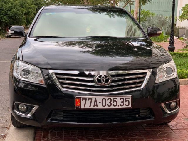 Xe Toyota Camry 2.4G đời 2010, màu đen0