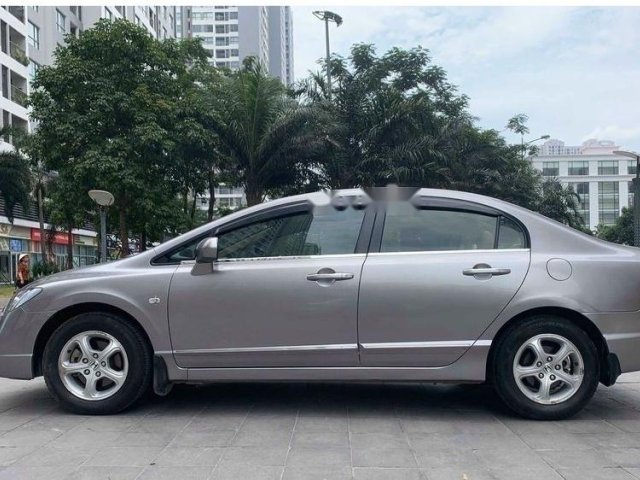 Bán lại chiếc xe Honda Civic 1.8 AT Đk 2009, số tự động, màu ghi bạc