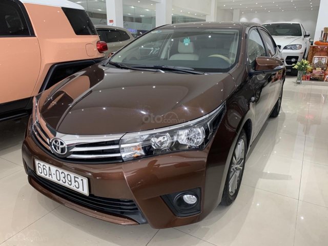 Cần bán xe Toyota Corolla altis 1.8G AT năm sản xuất 2016, xe chạy lướt 6.000 km, màu nâu, xe đẹp như mới