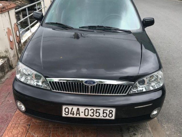 Cần bán Ford Laser đời 2002, màu đen, nhập khẩu  0