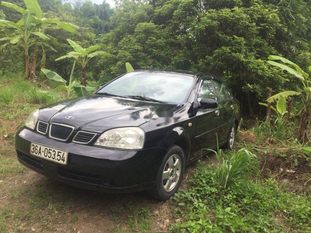 Bán xe Daewoo Lacetti sản xuất 2004, màu đen0