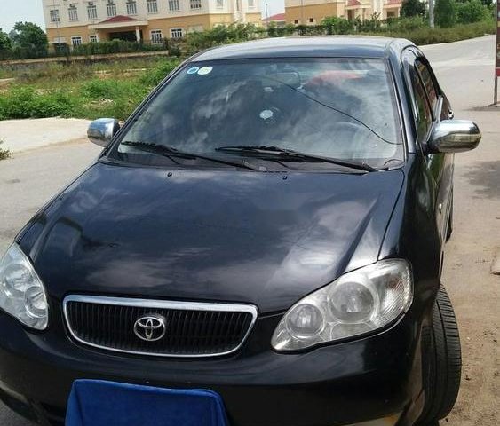 Cần bán lại xe Toyota Corolla altis năm sản xuất 2003, màu đen, máy êm