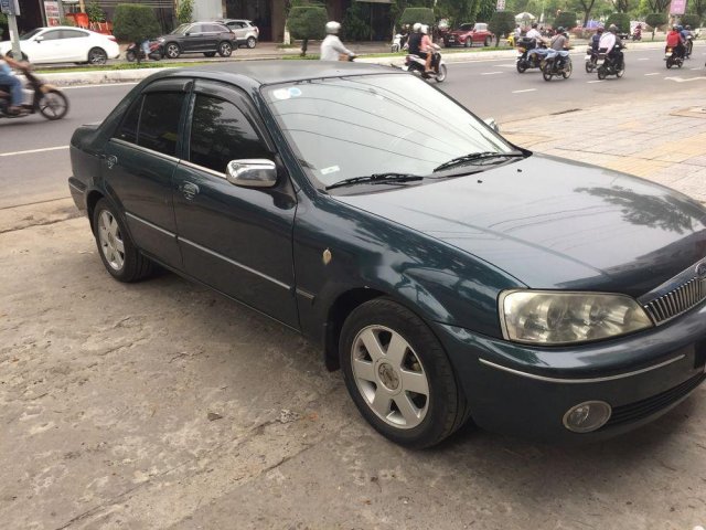 Cần bán Ford Laser 2002, màu xanh dưa