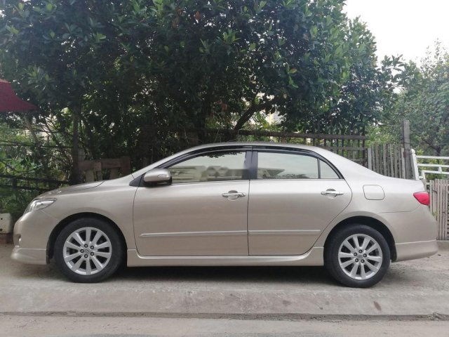 Bán xe Toyota Corolla altis 2.0V đời 2010, màu vàng cát0