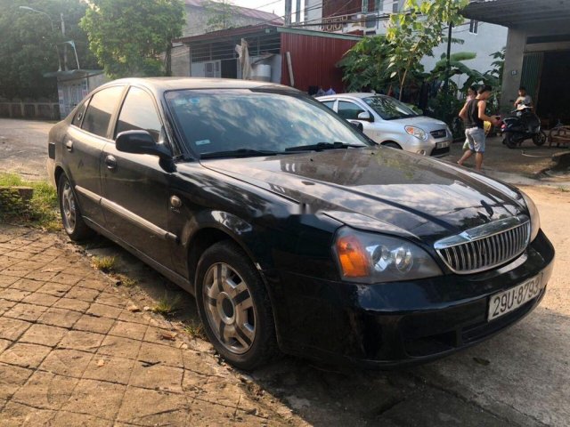 Cần bán lại xe Daewoo Magnus đời 2005, màu đen như mới0