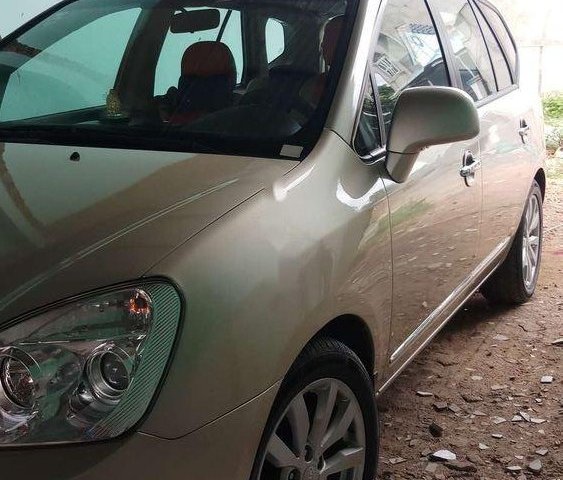 Bán Kia Carnival đời 2011, màu vàng, nhập khẩu nguyên chiếc giá cạnh tranh