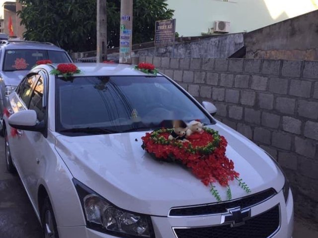 Bán Chevrolet Cruze LS năm 2010, màu trắng, xe rất đẹp và êm0