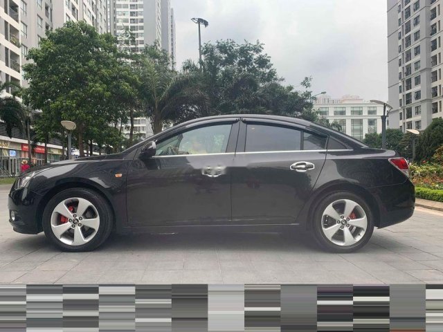 Chính chủ bán xe Daewoo Lacetti 1.6 CDX đời 2010, màu đen0