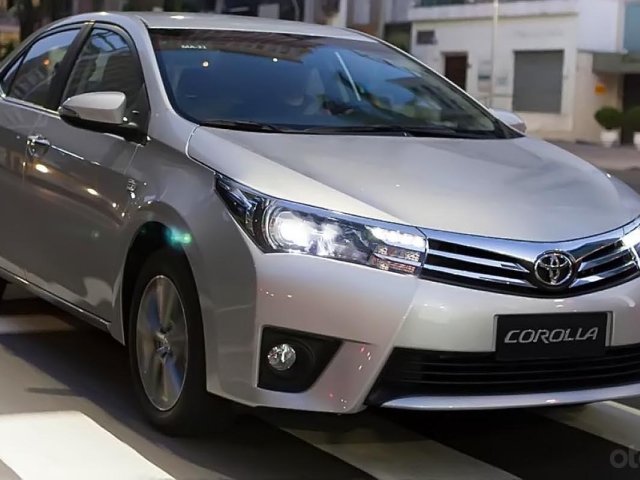 Bán ô tô Toyota Corolla Altis 1.8MT đời 2016, màu bạc, xe như mới đi 2,1 vạn km0