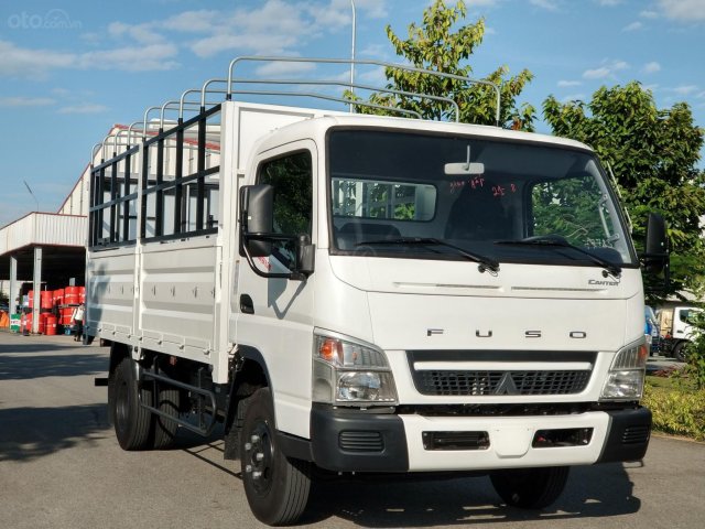 Bán xe tải Mitsubishi Fuso 6.5 thùng mui bạt - 3,4 tấn trả góp 80%0